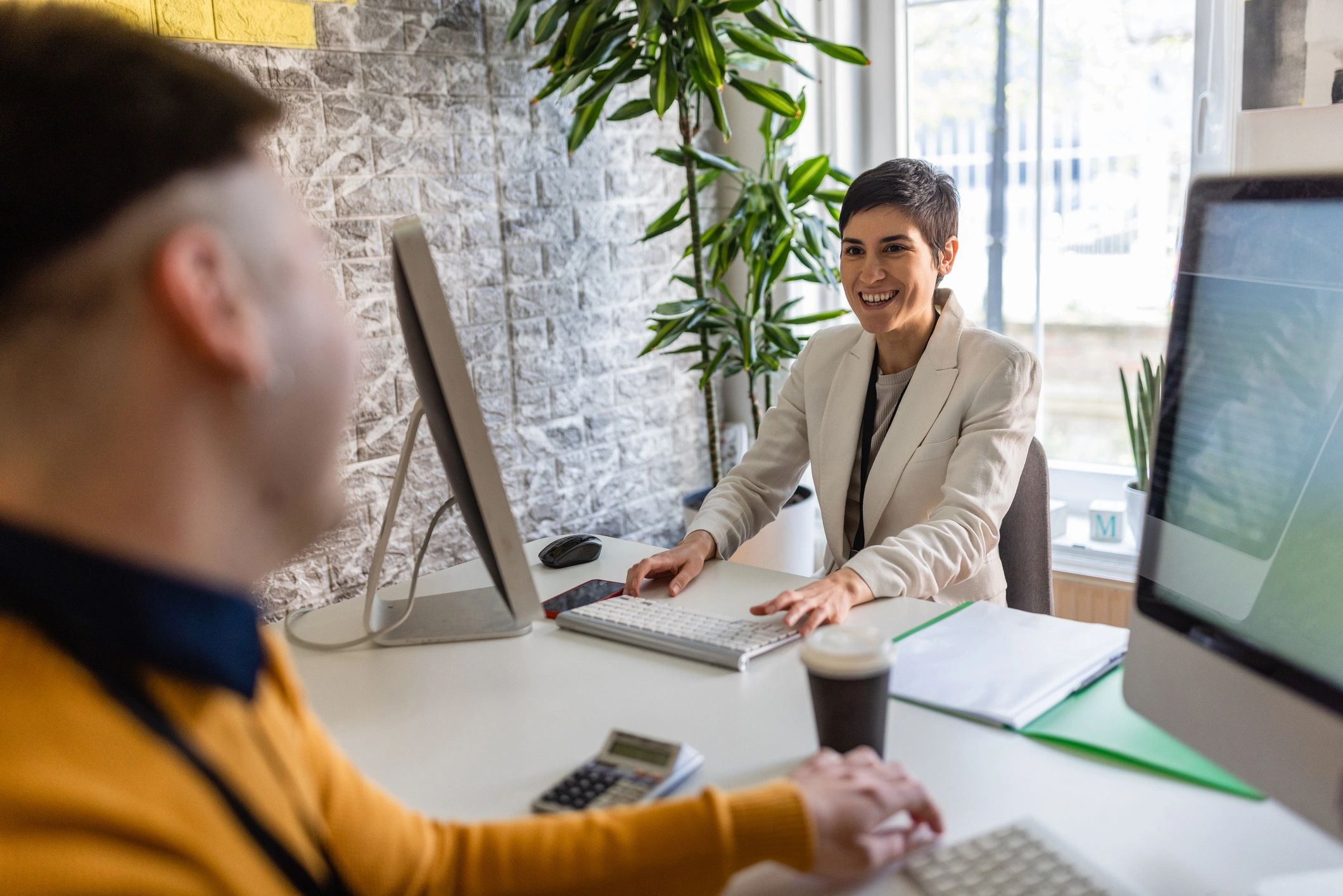 Accountant working in an office preparing accounts and tax filings